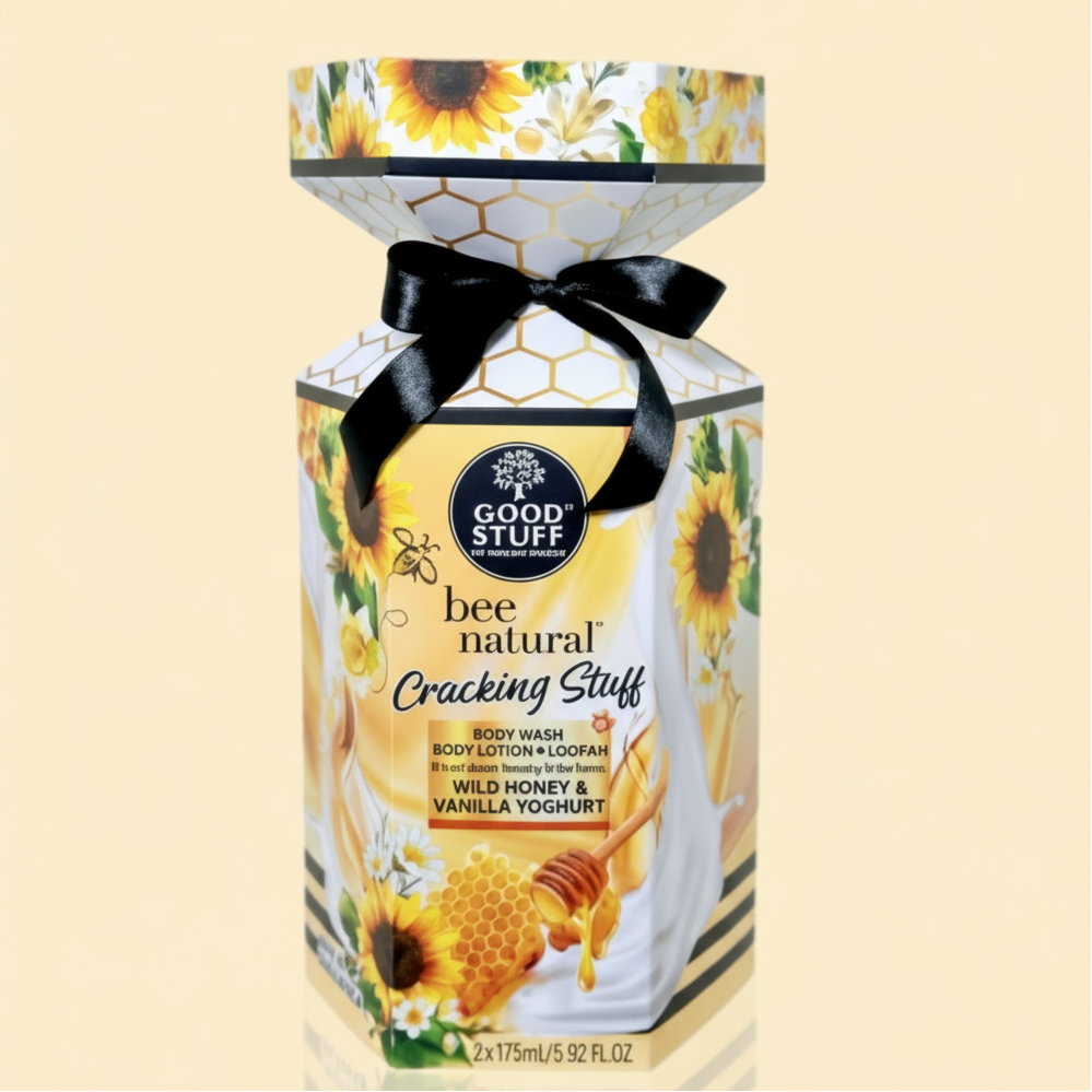 Good Stuff bee natural product packaging with sunflowers and honeycomb design on a beige background